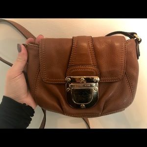 Michael Kors brown leather satchel.